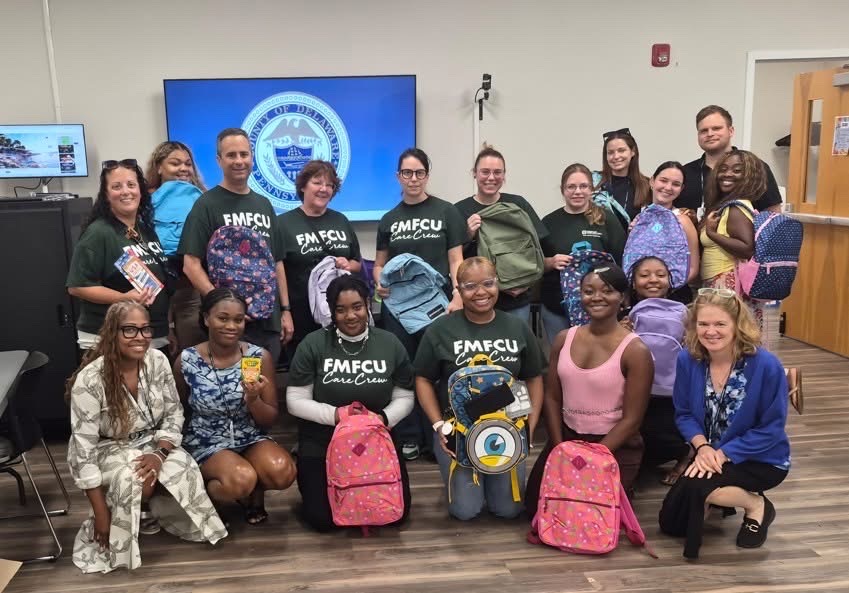FMFCU Foundation Back to School - packing backpacks